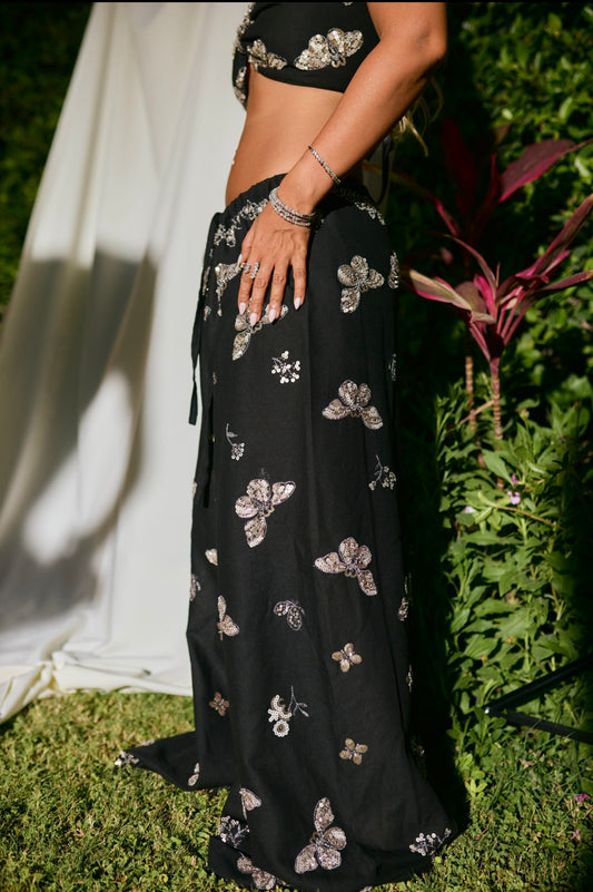 The beaded butterflies black pants